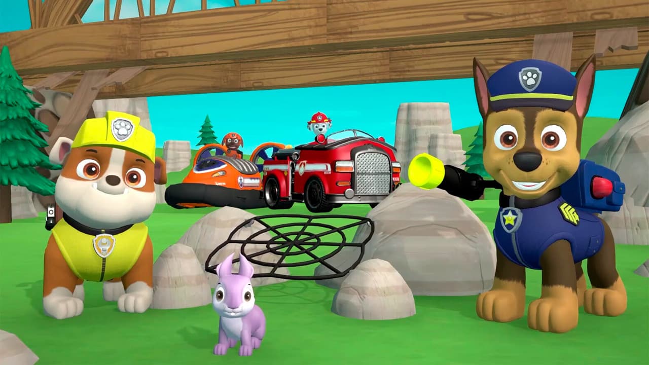 Three Paw Patrol: On a Roll characters, including ones dressed as a policeman and builder.