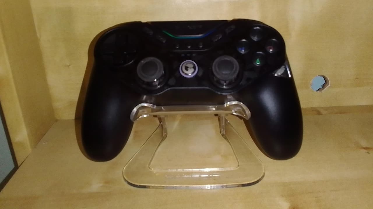 Gamesir Tarantula Pro controller on a stand